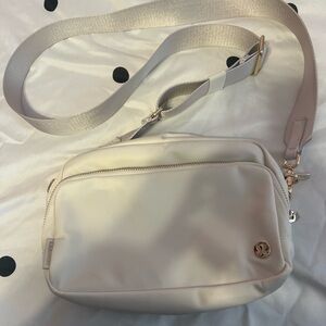 lululemon athletica Cream Crossbody Pouch with Gold Accents